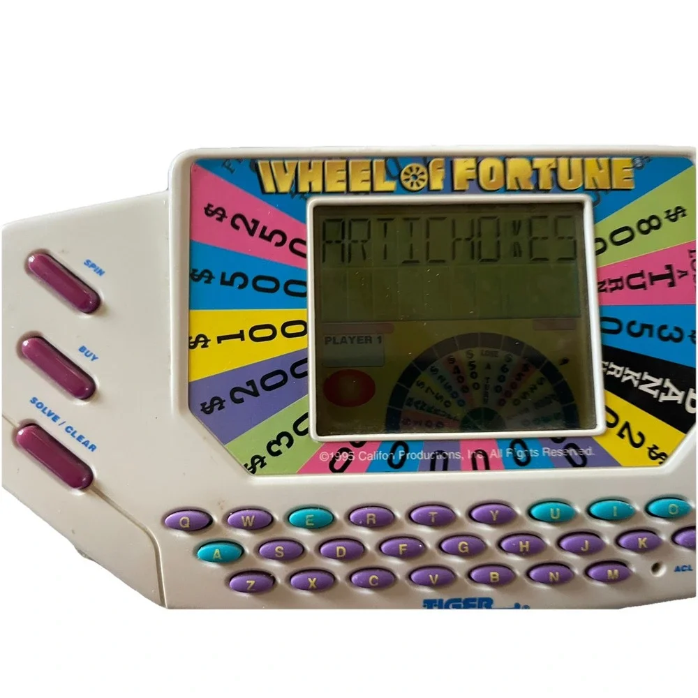 Vintage Tiger Electronics Wheel of Fortune Handheld Game Fun Family Working 1995